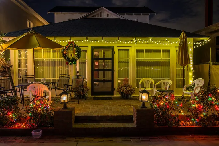 A back patio near Plano, Texas with professional landscape lighting installed by GroGreen
